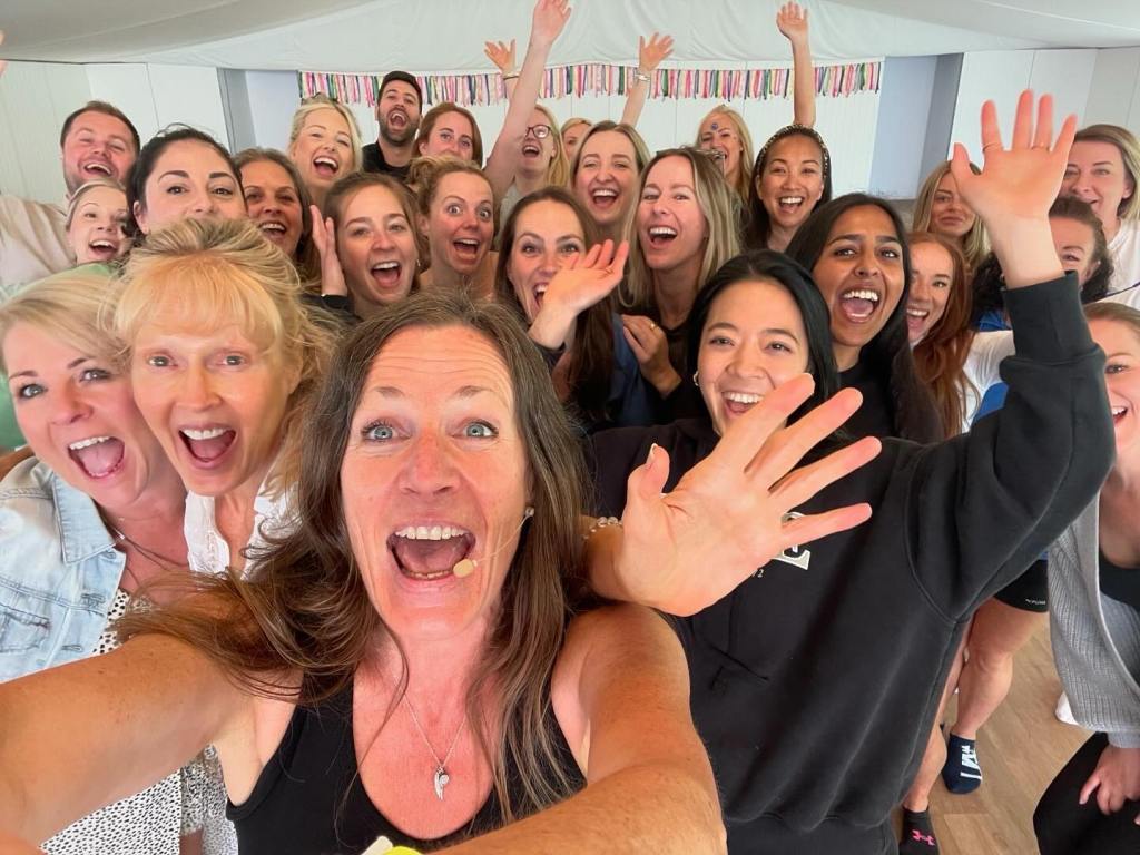 Cat Googe sharing laughter yoga at Happy Place Festival